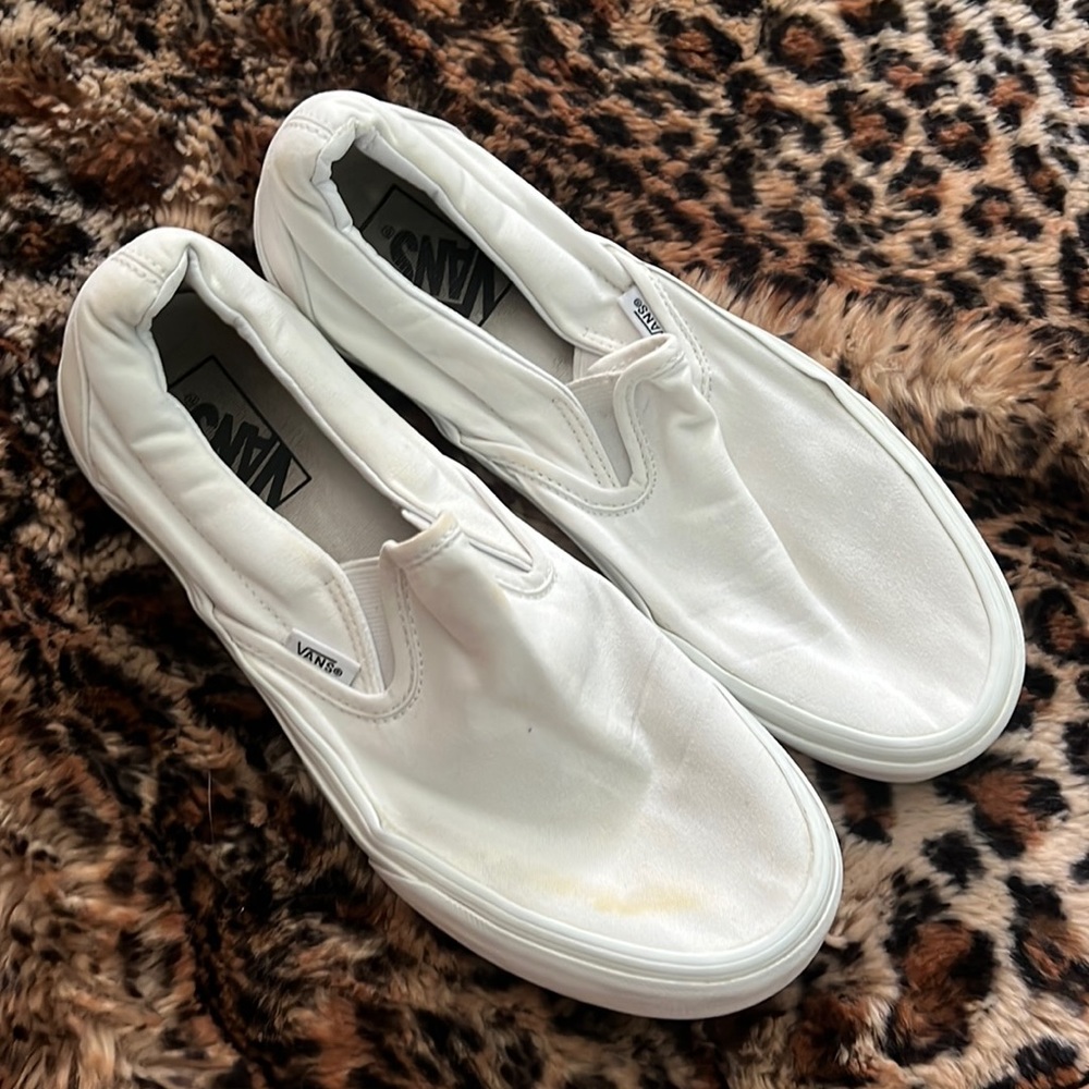 Vans white slip ons